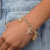 Juicy Couture Bracelet 7-7.5", Goldtone Charm Bracelets for Women with 6 Different Charms Featuring Clear Stones couture pop ups